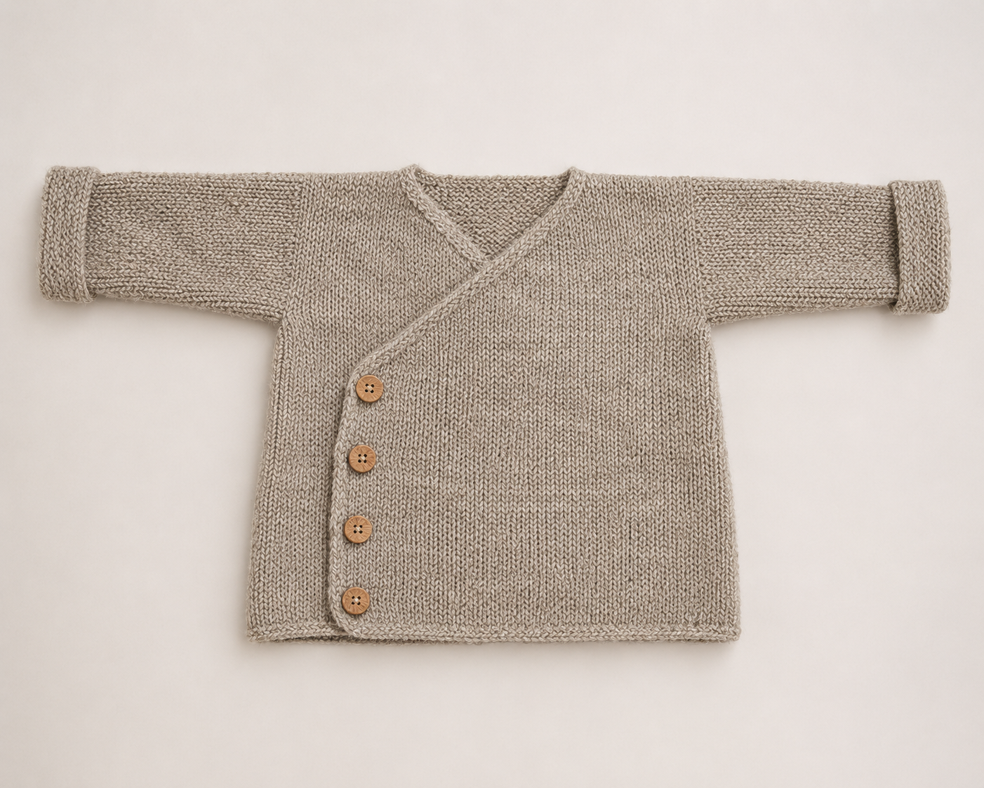 Breipatroon babyvestje met knoopjes, wollen vestje voor baby's
